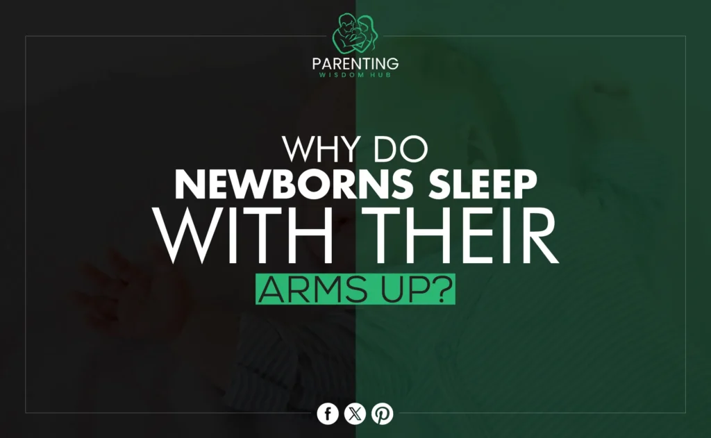 why do newborns sleep with their arms up